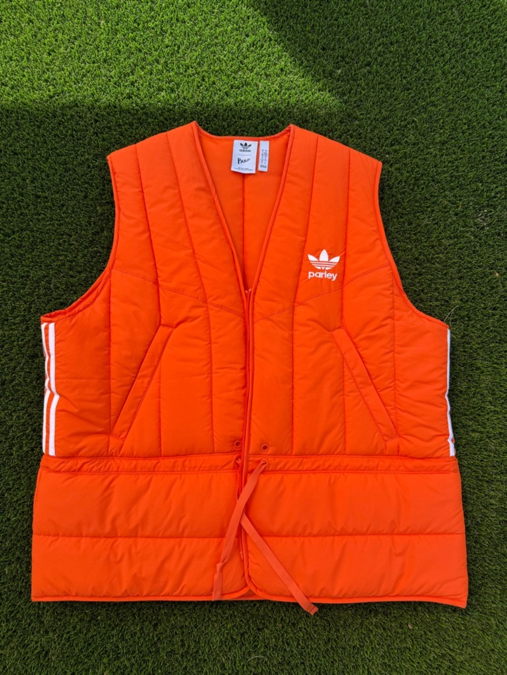 adidas Parley Quilted Vest in Bright Orange with White Logo
